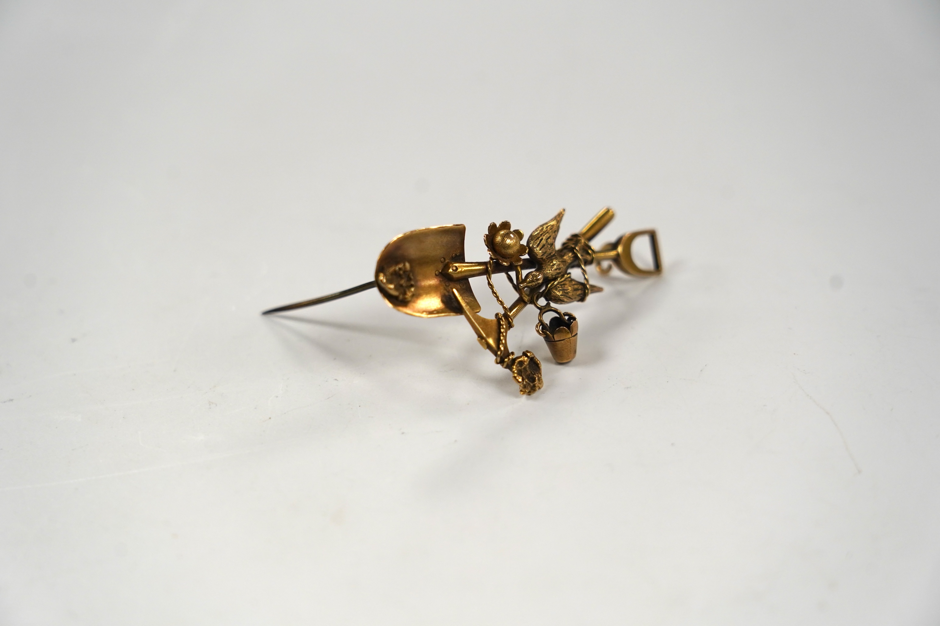 An early 20th century 18ct 'Australian miner's' brooch, 55mm, 9.2 grams.